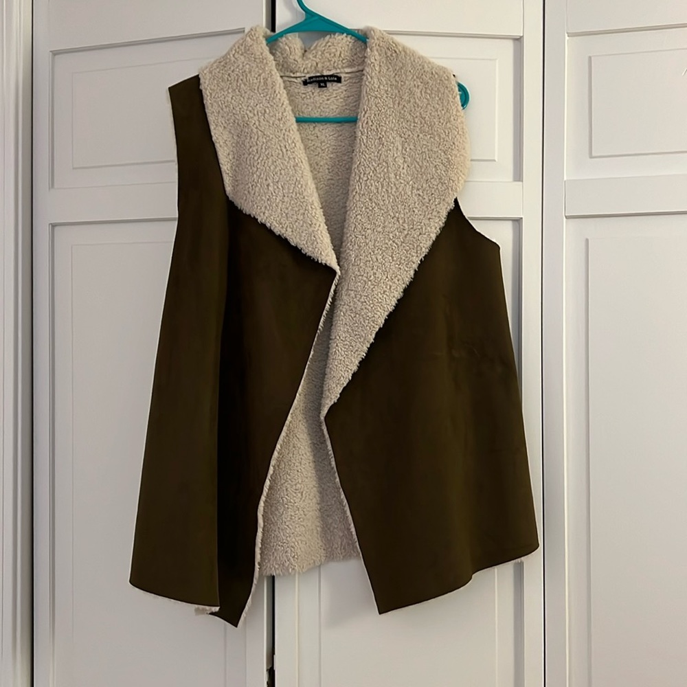 Sherpa, green vest